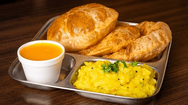 Mango Ras Puri Sabji.